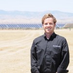 Andrew Fish of SunPower in front of the development