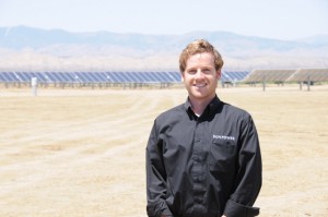 Andrew Fish of SunPower in front of the development